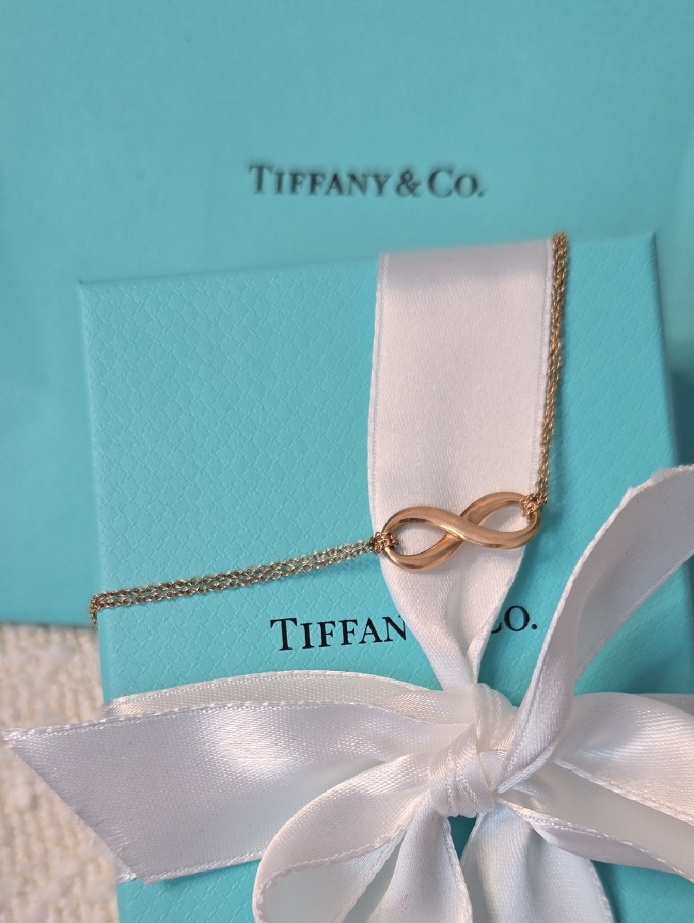 Tiffany & Co. Rose Gold Infinity Bracelet with Blue Box and Shopping Bag Set
